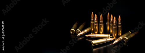 Cuadros en Lienzo Bullet isolated on black background with reflexion