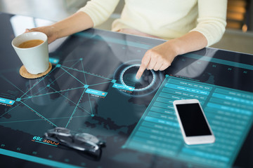 Poster - technology and people concept - close up of woman using interactive panel with virtual data and drinking coffee