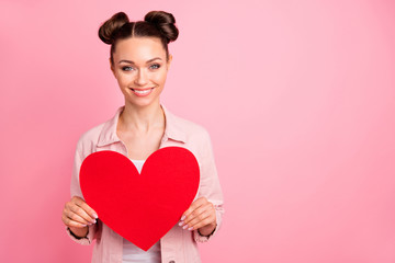 Sticker - Portrait of charming lady holding papercard heart smiling wearing jacket isolated over pink background