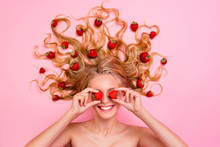 Vertical Side Profile Top Above High Angle View Photo Beautiful Toothy She Her Lady Lying Down Among Strawberries Long Curly Wavy Hair Arms Hands Hold Berry Hide Eyes Isolated Pink Background