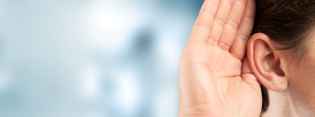 man ear listening, copy space background