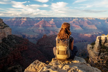 Wall Mural - A hiker in the Grand Canyon National Park, South Rim, Arizona, USA.