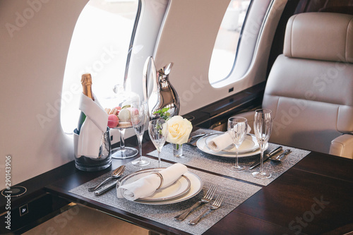 Fotomural modern and comfortable interior of business jet aircraft with decor