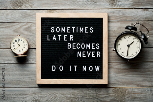 Fotografía Inspirational motivational quote Sometimes later becomes never