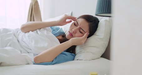 Wall Mural - woman has headache