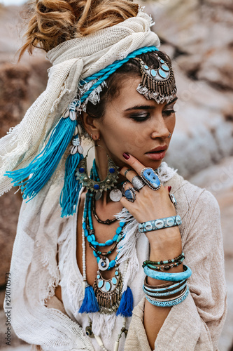 Plakat young tribal style woman with lot of boho accessories portrait