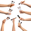 © Pixel-Shot - Female hands with makeup brushes on white background