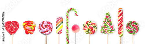 Different tasty lollipops on white background Tableau sur Toile