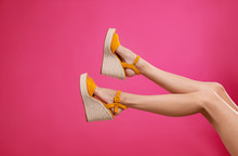 Woman In Stylish Shoes On Pink Background
