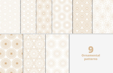 Big set of 9 oriental patterns. White and gold background with Arabic ornaments. Patterns, backgrounds and wallpapers for your design. Textile ornament. Vector illustration.
