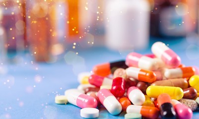 Sticker - Colorful pills and tablets on background