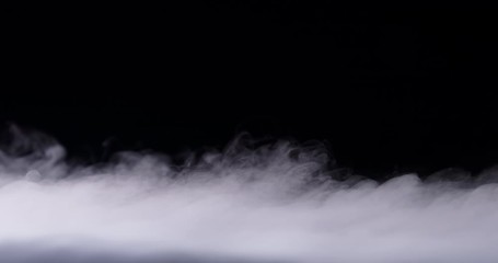 Wall Mural - realistic dry ice smoke clouds fog overlay perfect for compositing into your shots. simply drop it i