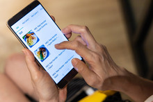 Person Ordering Food Online Via App On Smart Phone.