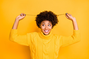 Poster - Close up photo portrait of cute dreamy pretty nice cheerful interested attractive charming thoughtful lady checking haircut after going to hairdresser stretching curls isolated bright color background