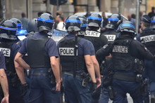 Police Force Photographed During A Demonstration