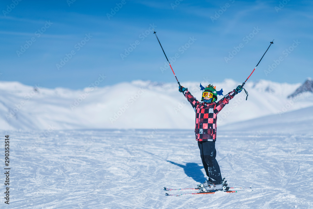 Young Skier on Top of Ski Resort - obrazy, fototapety, plakaty 