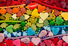 Assortment Of Candy Ordered In Rainbow Colors