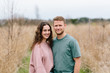 © Jakob Lagerstedt/Stocksy - Attractive young couple standing close to each other