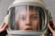 © Danil Nevsky/Stocksy - Sensual girl wearing retro space helmet