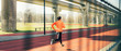© Ivo de Bruijn/Stocksy - Runner or athlete running on a running track, warming up.