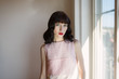 © Jodie Johnson/Stocksy - Retro styled portrait with negative space