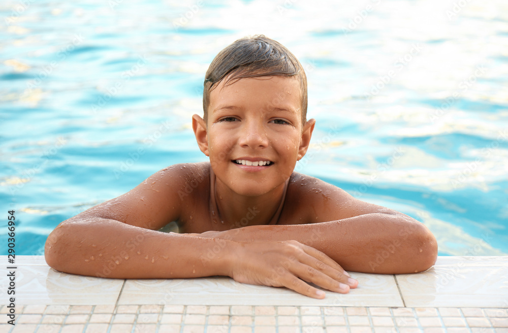 Happy cute boy in swimming pool Stock Photo | Adobe Stock