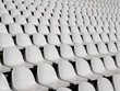 © Pixel Stories/Stocksy - Empty white seats in a stadium