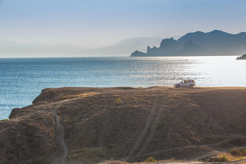 Canvas Print - Off-road car by the sea