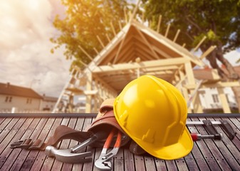 Canvas Print - Yellow hard hat with tools