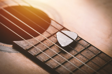 Wall Mural - guitar pick on guitar