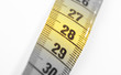 © michaklootwijk - Measuring tape, selective focus on 28