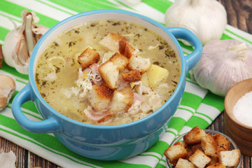 Wall Mural - A bowl with traditional Czech garlic soup cesnecka