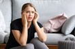 © Pixel-Shot - Woman having panic attack at home