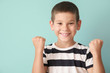© Pixel-Shot - Portrait of happy little boy on color background
