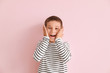 © Pixel-Shot - Portrait of happy little boy on color background