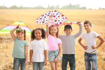 Wall Mural - Little children flying kites outdoors