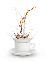  milk coffee splash in white cup isolated