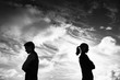 © kieferpix - Silhouette of upset man and woman with backs turned away from each other. Couple fighting and not getting along concept. .