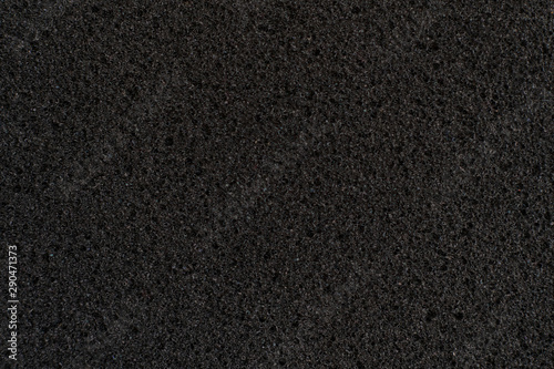 Fotografía abstract dark black foam rubber texture, macro view, protection textured surface