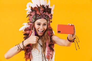 Sticker - Woman in carnival suit take selfie by mobile phone showing thumbs up.