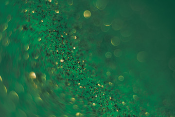 Poster - Beautiful abstact  light bokeh on a green background.