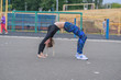 © Павел Костенко - Girl stretches on the playground