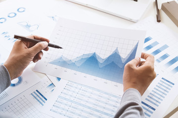 Fototapete - businessman working data document graph chart report marketing research development  planning management strategy analysis financial accounting. Business  office concept.