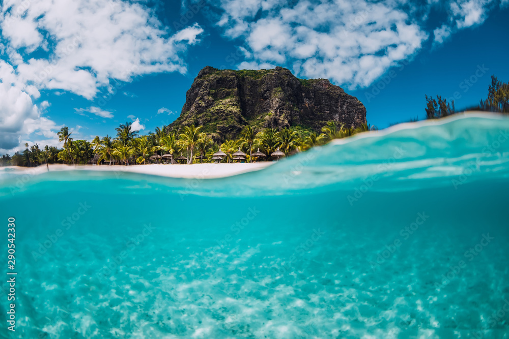 Tropical crystal ocean with Le Morne mountain and luxury beach in Mauritius. Split view. - obrazy, fototapety, plakaty 