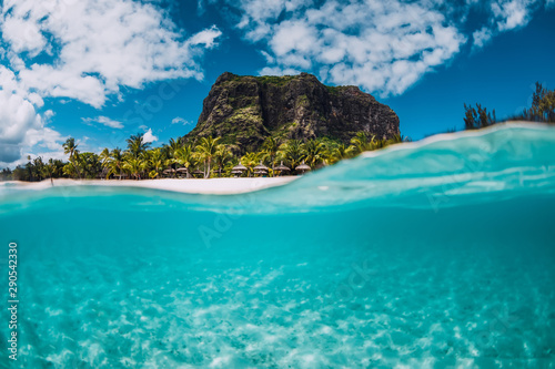 tropical-crystal-ocean-with-le-morne-mountain-and-luxury-beach-in-mauritius-split-view