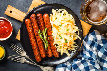 Wall Mural - Sausage, sauerkraut, bretzels and beer.