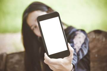 Wall Mural - woman showing black smartphone