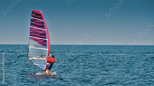 Fototapety Windsurfing  surfer-na-morzu