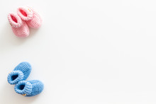 Booties For Newborn Boy And Girl On White Background Top View Mockup