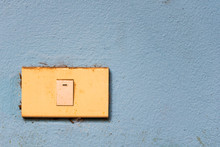 Old Switch With Old Blue Wall